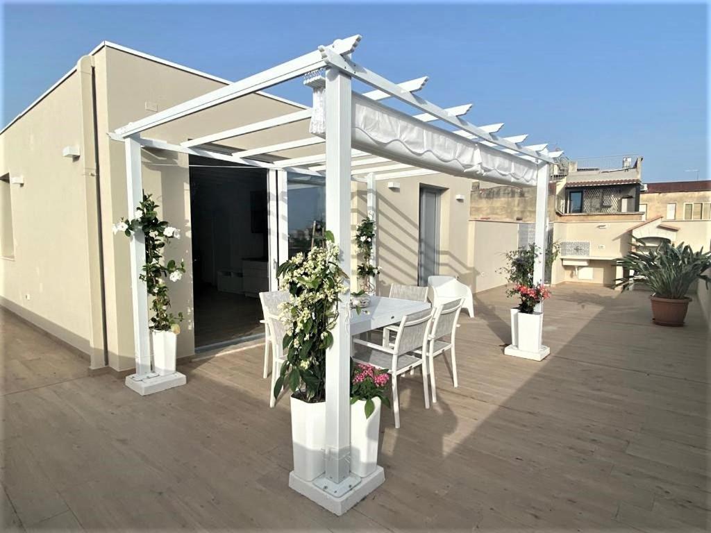 Rossini Penthouse Apartment Cagliari Bagian luar foto